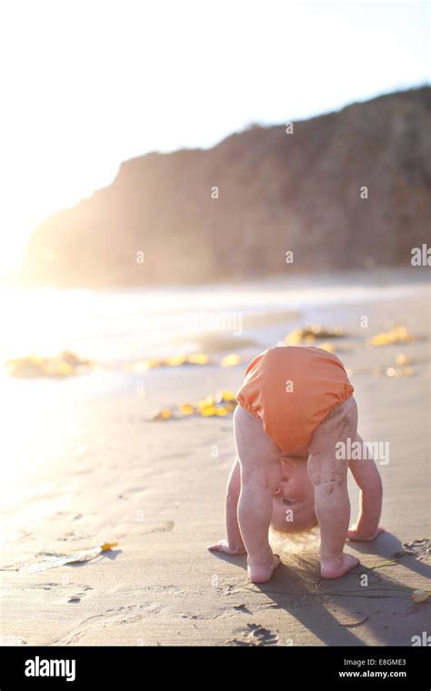 Child Bending Over Boy Hi Res Stock Photography And Images Alamy