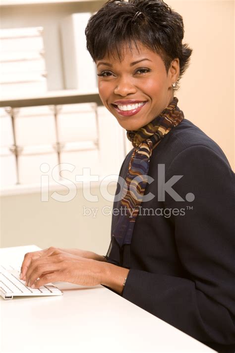 African American Female Typing At Desk Stock Photo Royalty Free