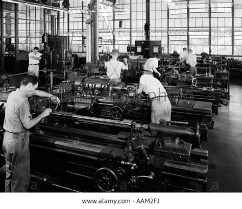 1930s Group Of Men Operating Lathes In Large Factory Machine Shop