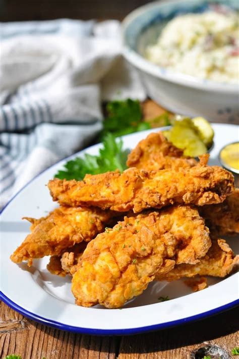 Golden, delicious flour based breading crisps around buttermilk marinated chicken strips. Fried Chicken Tenders With Buttermilk Secret Recipe ...