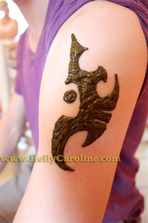 The dark #mehendi design would ready adore your kid's hands. Henna by Kelly Caroline, Henna Tattoos Michigan