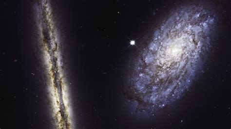 Every year for this anniversary, the hubble team releases a new special anniversary image. NASA's Hubble telescope captured two galaxies in one epic ...