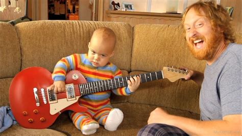 Baby Playing Guitar