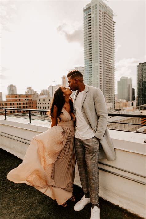 downtown los angeles rooftop engagement shoot — tida svy engagement photo outfits couples
