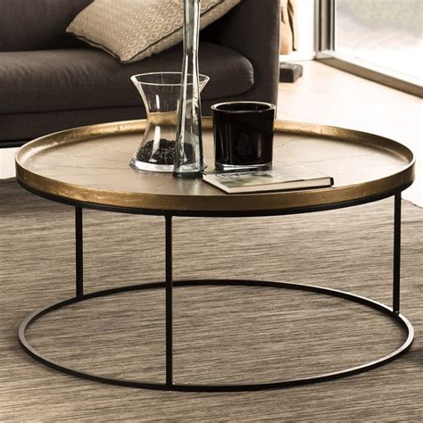 Selection de table basse faite pour vous ! Table basse vintage ronde avec plateau en aluminium doré ...