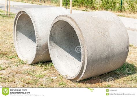 Two Concrete Water Pipes Or Tubes On The Street Prepared For New Supply