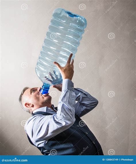 Man With A Giant Water Bottle Stock Image Image Of Conceptual
