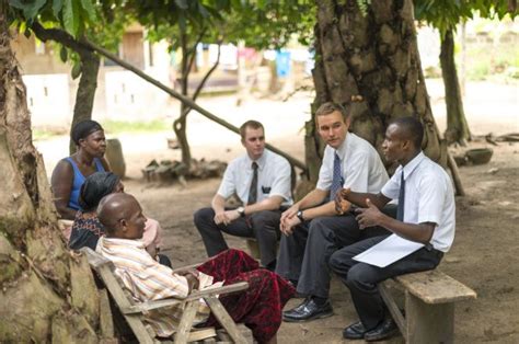 Three Elder Missionaries Teaching Three People In Africa Missionary Mormon Mormon Missionaries