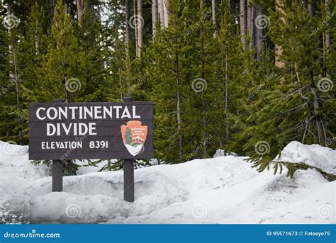 Continental Divide Sign On Mountain In Snow Yellowstone Nation