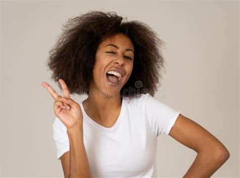 Portrait Of Cool Beautiful African American Woman With Happy Funny Face Expression And Afro Hair