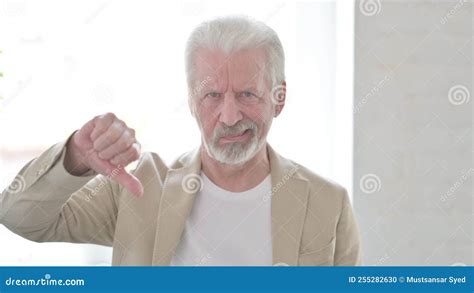 Portrait Of Old Man Showing Thumbs Down Stock Photo Image Of