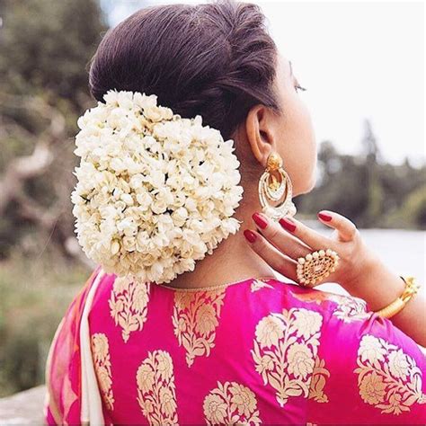 wedding hairstyle with jasmine flower