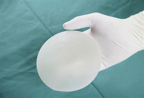 This Rare Cancer Is Linked To Breast Implants Helloflo