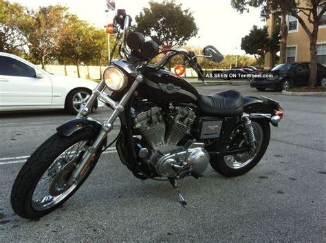 The fork tubes were shortened 2 revised shock angle a softer seat at 26.75, (1.75 lower than standard) production 2003: 2003 Harley - Davidson Sportster 100th Anniversary Xl883c ...