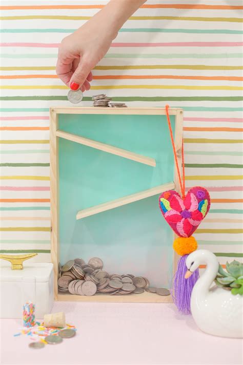 Please share your idea in comment. How to Make a Rolling Coin Bank » Lovely Indeed