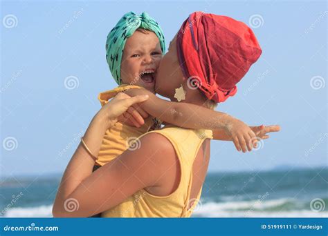 Young Mother Hugging Her Daughter On Beach Stock Image Image Of Active Daughter 51919111