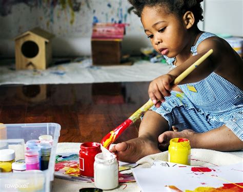 Black Kid Enjoying Color Painting Premium Image By