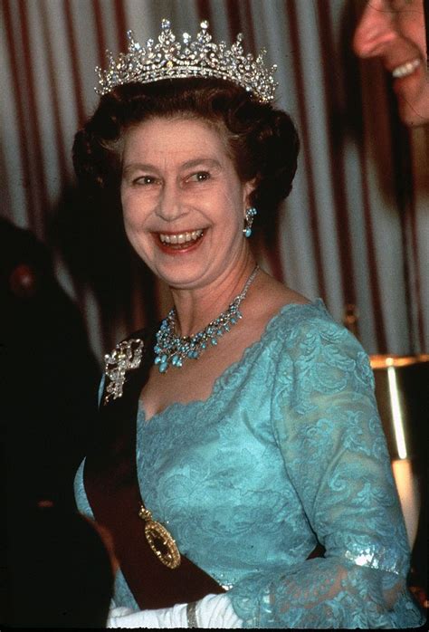 One statement from buckingham palace say: Queen Elizabeth ll smiles during a banquet during 1982 in ...