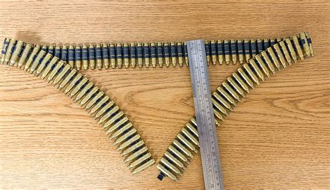 bullet belt m16 223 caliber black metal link brass shell copper tips usa made