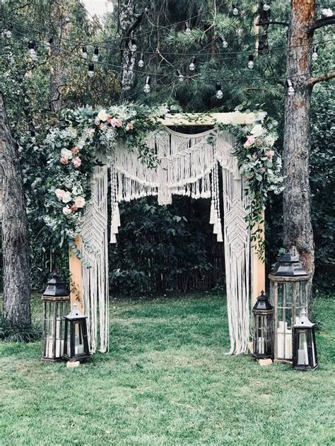 A pair & a spare made a beautiful macrame wall hanging and dipped just the tips into some color. Bohemian Macrame wedding backdrop, Macrame wedding arch ...