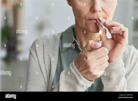 Mature Woman Smoking Cigarette Hi Res Stock Photography And Images Alamy