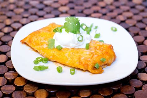 Add shredded chicken, covering the stuffing evenly. Sour Cream Chicken Enchiladas | easy. everyday. eats ...
