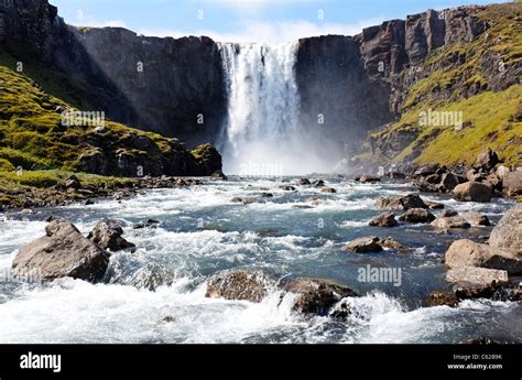 Gufufoss Waterfall Above The Village Of Seydisfjordur Eastern Fjords