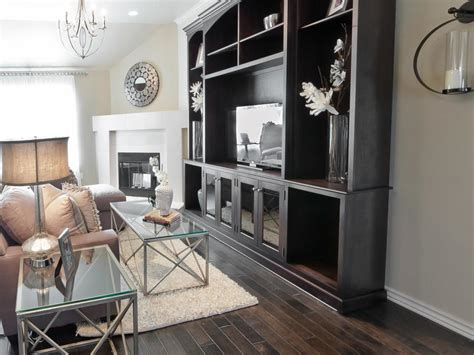 Transitional Neutral Living Room With Dark Wood Floor And Entertainment