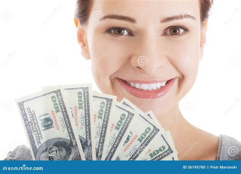 Young Beautiful Casual Woman Holding Large Sum Of Money Stock Photo
