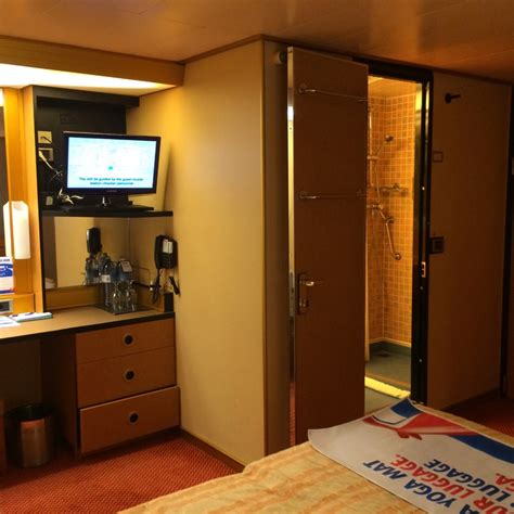 The inside stateroom on the carnival triumph features 2 twin beds that can be converted to a queen sized bed. Carnival Triumph Cabins and Staterooms