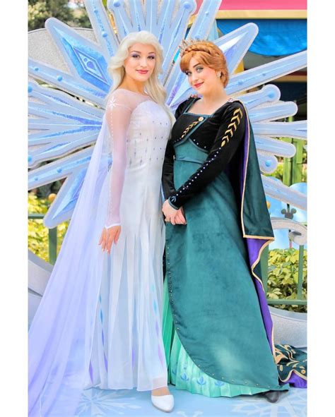 Elsa Anna Debut Their NEW Frozen Looks In Hong Kong Disneyland Photo From