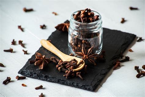 Star Anise And Cloves In Glass Jar Stock Image Image Of Cloves
