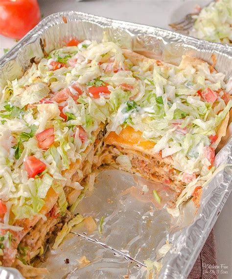 Taco Lasagna Is A Delicious Easy Dinner With Layers Of Beef Tortillas And Seasoning All