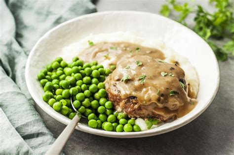 Ground sirloin hamburger steaks topped with gravy made with caramelized onions, mushrooms, garlic and beef stock. Hamburger Steaks and Gravy Recipe