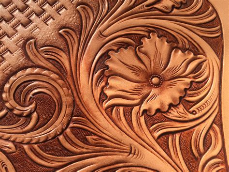 Maybe you would like to learn more about one of these? leather carving | Leather tooling patterns, Leather art ...