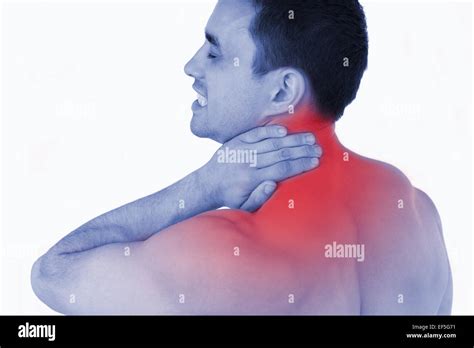Young Man Suffering From Neck Pain Stock Photo Alamy