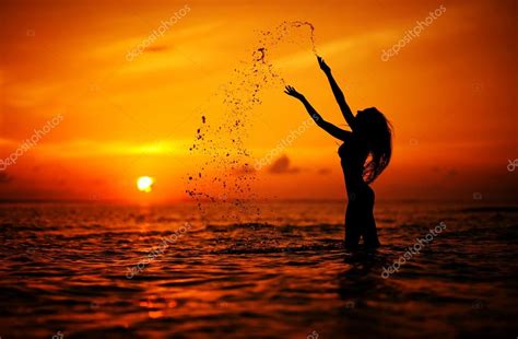 Long Hair Woman Silhouette In The Sea Splashing Water ⬇
