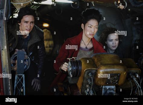 from left robert sheehan as tom natsworthy jihae as anna fang and hera hilmar as hester shaw