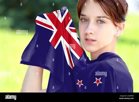 Young Girl Holding The Flag Of New Zealand Close Up Stock Photo Alamy