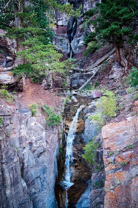 Tiers Of Very Tall Waterfalls Cutting Through Canyon Gorge In The