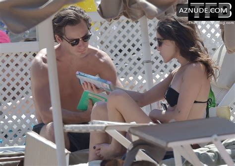 rainey qualley sexy seen flaunting her hot figure wearing a bikini with lewis pullman in