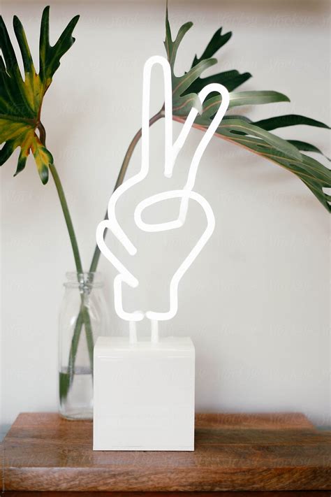 Peace Sign Hands Neon Light By Stocksy Contributor Pink House