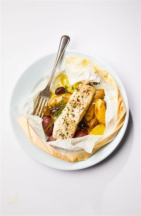 2 in a medium bowl, toss the shiitakes with the lemon juice, salt, and pepper. Parchment-Baked Halibut with Thyme and Olives | Recipe in ...