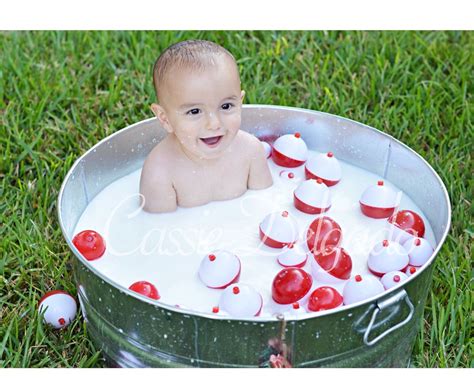 Little baby boy lying on the white towel with yellow rubber duck before baby boy under the towel after bathing at home. Pin by Kayla Morris on Baker's Birthday | First birthday ...
