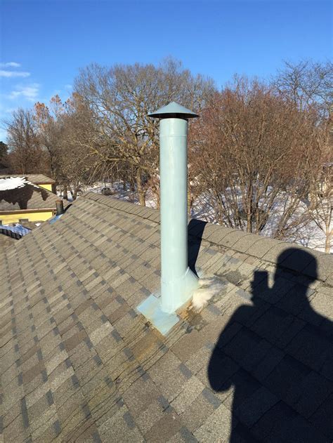 Condensation at roof, down outside of furnace/water heater vent. What