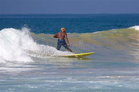 Surfer On Big Waves In Hikkaduwa Sri Lanka Editorial Stock Image
