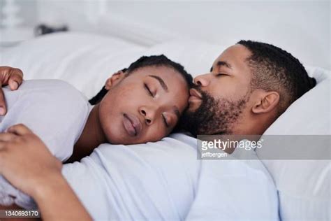 Black Couple Sleeping In Bed Photos And Premium High Res Pictures Getty Images