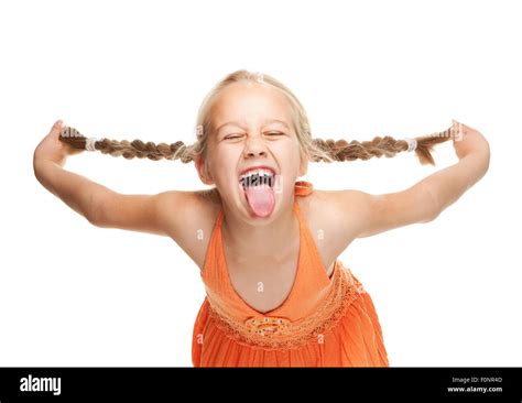Little Girl Making Funny Face Stock Photo Alamy