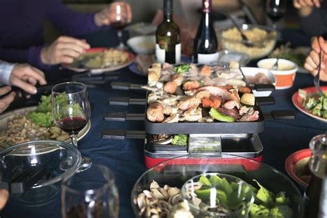 All the makings for a fondue dinner party, including a full menu for cheese, meat and seafood fondues, a chocolate fondue, plus all the dips, sauces and dippers! How to Serve and Prepare Raclette for a Dinner Party