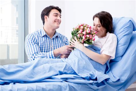 The Caring Loving Husband Visiting Pregnant Wife In Hospital Stock Image Image Of Husband
